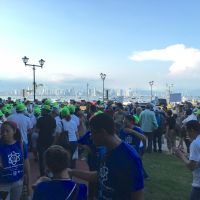 Supporters of science congregate at the very end of the Caminata por la Ciencia. Panama City's skyline is in the background.