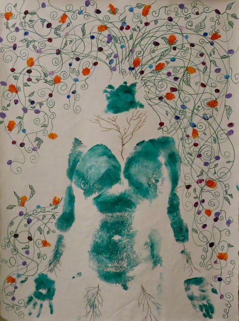paint imprint of woman's body with drawn plants flowing from her head